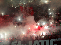 CR Belouizdad fans applaud their team during the football match between USM Alger and CR Belouizdad on the 5th day of the Algerian Ligue 1 c...