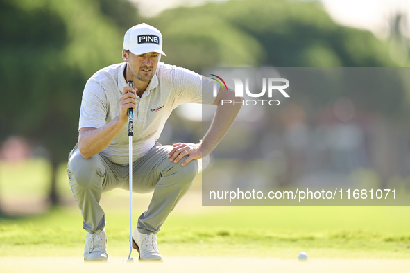 Victor Perez of France studies his shot on the 1st green on the third day of the Estrella Damm N.A. Andalucia Masters 2024 at Real Club de G...