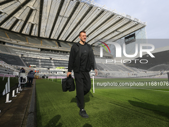 Dan Burn of Newcastle United plays during the Premier League match between Newcastle United and Brighton and Hove Albion at St. James's Park...