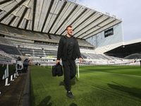 Dan Burn of Newcastle United plays during the Premier League match between Newcastle United and Brighton and Hove Albion at St. James's Park...