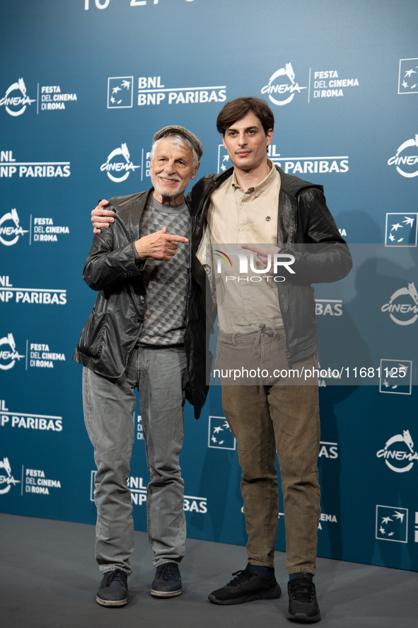 Michele Placido and Michelangelo Placido attend the ''Eterno Visionario'' photocall during the 19th Rome Film Festival at Auditorium Parco D...