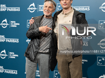 Michele Placido and Michelangelo Placido attend the ''Eterno Visionario'' photocall during the 19th Rome Film Festival at Auditorium Parco D...