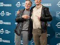 Michele Placido and Michelangelo Placido attend the ''Eterno Visionario'' photocall during the 19th Rome Film Festival at Auditorium Parco D...