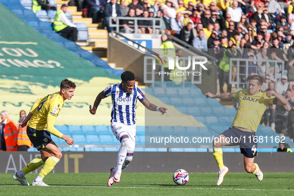 Grady Diangana of WBA races forward as Will Vaulks of Oxford moves to intercept during the Sky Bet Championship match between Oxford United...