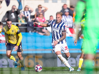 Uros Racic of WBA is in attacking action during the Sky Bet Championship match between Oxford United and West Bromwich Albion at the Kassam...