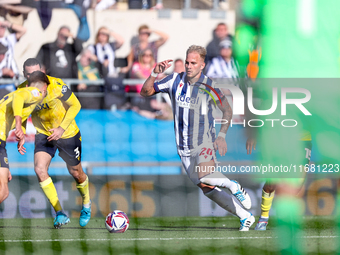 Uros Racic of WBA is in attacking action during the Sky Bet Championship match between Oxford United and West Bromwich Albion at the Kassam...