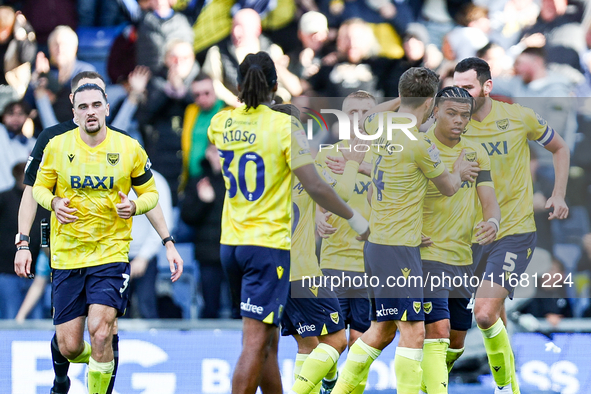 Dane Scarlett of Oxford (second from right) is congratulated for his goal, making it 1-1 during the Sky Bet Championship match between Oxfor...