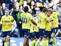 Dane Scarlett of Oxford (second from right) is congratulated for his goal, making it 1-1 during the Sky Bet Championship match between Oxfor...