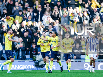 Dane Scarlett of Oxford is congratulated for his goal, making it 1-1 during the Sky Bet Championship match between Oxford United and West Br...