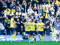 Dane Scarlett of Oxford is congratulated for his goal, making it 1-1 during the Sky Bet Championship match between Oxford United and West Br...