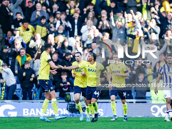 Dane Scarlett of Oxford is congratulated for his goal, making it 1-1 during the Sky Bet Championship match between Oxford United and West Br...