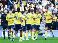 Dane Scarlett of Oxford is congratulated for his goal, making it 1-1 during the Sky Bet Championship match between Oxford United and West Br...