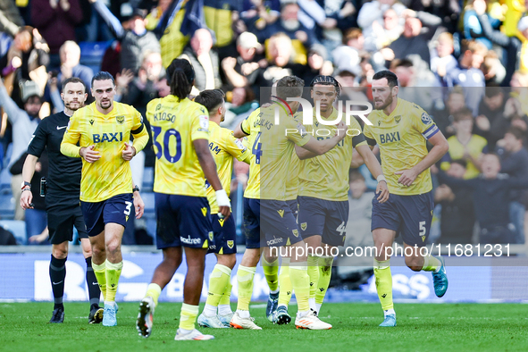 Dane Scarlett of Oxford is congratulated for his goal, making it 1-1 during the Sky Bet Championship match between Oxford United and West Br...