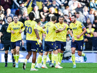 Dane Scarlett of Oxford is congratulated for his goal, making it 1-1 during the Sky Bet Championship match between Oxford United and West Br...