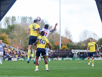 Elliott Moore of Oxford and Grady Diangana of WBA battle in the air during the Sky Bet Championship match between Oxford United and West Bro...