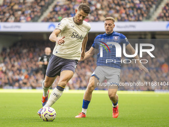 Liam Delap of Ipswich Town puts pressure on James Tarkowski of Everton during the Premier League match between Ipswich Town and Everton at P...