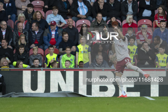 Anis Mehmeti celebrates after scoring the opening goal during the Sky Bet Championship match between Middlesbrough and Bristol City at the R...