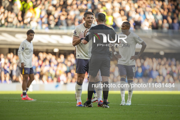 James Tarkowski of Everton interacts with the referee, Michael Oliver, during the Premier League match between Ipswich Town and Everton at P...