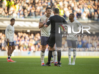 James Tarkowski of Everton interacts with the referee, Michael Oliver, during the Premier League match between Ipswich Town and Everton at P...