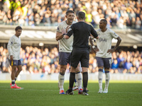 James Tarkowski of Everton interacts with the referee, Michael Oliver, during the Premier League match between Ipswich Town and Everton at P...