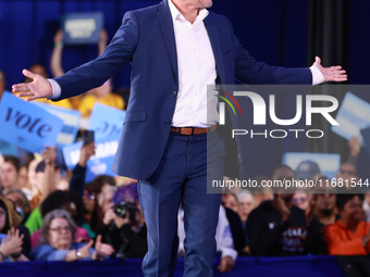 Waterford, MICHIGAN - OCTOBER 18: Oakland County Exective David Coulter enters onto the stage prior to US Vice President and Democratic pres...