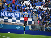 Emil Audero of Calcio Como warms up before the Italian Serie A football match between Calcio Como and Parma Calcio 1913 at the Giuseppe Seni...