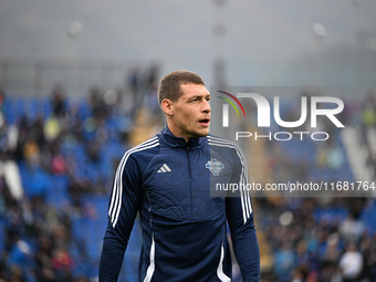 Andrea Belotti of Calcio Como warms up before the Italian Serie A football match between Calcio Como and Parma Calcio 1913 at the Giuseppe S...