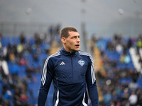 Andrea Belotti of Calcio Como warms up before the Italian Serie A football match between Calcio Como and Parma Calcio 1913 at the Giuseppe S...