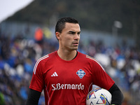 Emil Audero of Calcio Como warms up before the Italian Serie A football match between Calcio Como and Parma Calcio 1913 at the Giuseppe Seni...