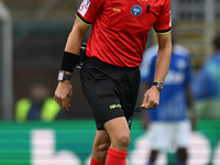 Referee Michael Fabbri gives a red card to Patrick Cutrone of Calcio Como during the Italian Serie A football match between Calcio Como and...