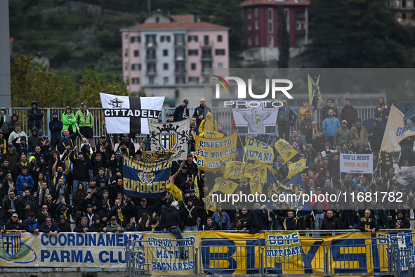 Parma Calcio 1903 supporters attend the Italian Serie A football match between Calcio Como and Parma Calcio 1913 in Como, Italy, on October...