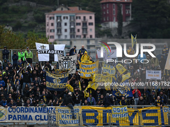 Parma Calcio 1903 supporters attend the Italian Serie A football match between Calcio Como and Parma Calcio 1913 in Como, Italy, on October...