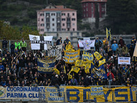 Parma Calcio 1903 supporters attend the Italian Serie A football match between Calcio Como and Parma Calcio 1913 in Como, Italy, on October...