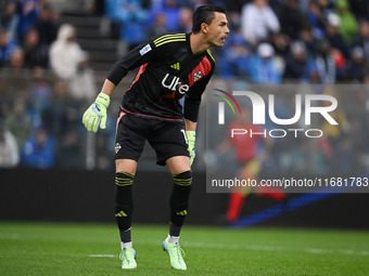 Emil Audero of Calcio Como participates in the Italian Serie A football match between Calcio Como and Parma Calcio 1913 at the Giuseppe Seni...