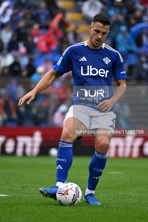 Marc Oliver Kempf of Calcio Como participates in the Italian Serie A football match between Calcio Como and Parma Calcio 1913 in Como, Italy...