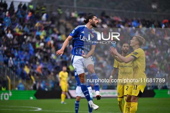 Alberto Dossena of Calcio Como participates in the Italian Serie A football match between Calcio Como and Parma Calcio 1913 in Como, Italy,...