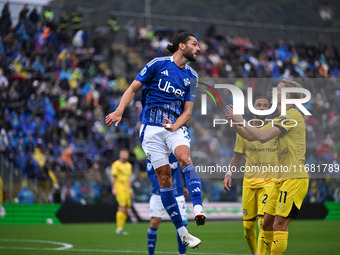 Alberto Dossena of Calcio Como participates in the Italian Serie A football match between Calcio Como and Parma Calcio 1913 in Como, Italy,...