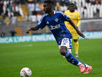 Alieu Fadera of Calcio Como participates in the Italian Serie A football match between Calcio Como and Parma Calcio 1913 at the Giuseppe Sen...