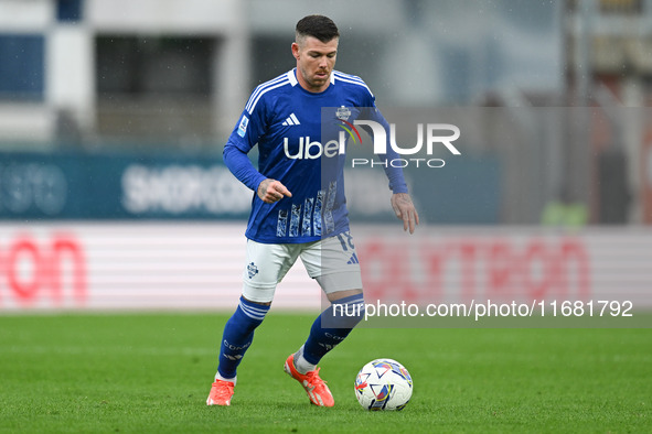 Alberto Moreno of Calcio Como participates in the Italian Serie A football match between Calcio Como and Parma Calcio 1913 in Como, Italy, o...