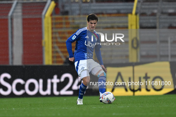 Maximo Perrone of Calcio Como participates in the Italian Serie A football match between Calcio Como and Parma Calcio 1913 at the Giuseppe S...