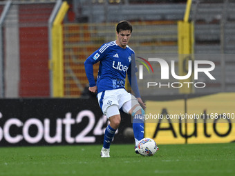 Maximo Perrone of Calcio Como participates in the Italian Serie A football match between Calcio Como and Parma Calcio 1913 at the Giuseppe S...