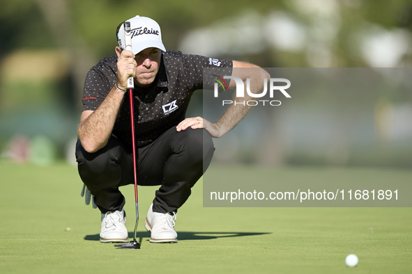 Julien Guerrier of France studies his shot on the 15th green on the third day of the Estrella Damm N.A. Andalucia Masters 2024 at Real Club...