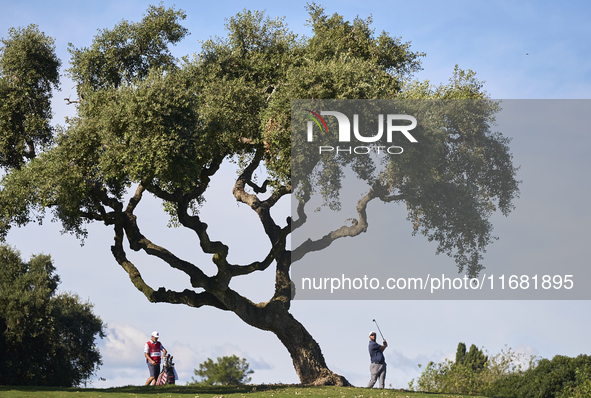 Jon Rahm of Spain plays his second shot on the 15th hole on the third day of the Estrella Damm N.A. Andalucia Masters 2024 at Real Club de G...