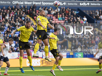 Mason Bennett #32 of Burton Albion F.C. clears the area during the Sky Bet League 1 match between Bolton Wanderers and Burton Albion at the...