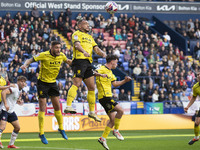 Mason Bennett #32 of Burton Albion F.C. clears the area during the Sky Bet League 1 match between Bolton Wanderers and Burton Albion at the...