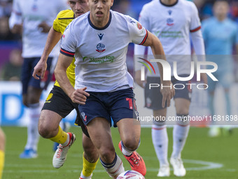 Dion Charles #10 of Bolton Wanderers F.C. is in possession of the ball during the Sky Bet League 1 match between Bolton Wanderers and Burton...