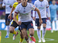 Dion Charles #10 of Bolton Wanderers F.C. is in possession of the ball during the Sky Bet League 1 match between Bolton Wanderers and Burton...