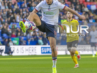 Aaron Collins #19 of Bolton Wanderers F.C. is in action during the Sky Bet League 1 match between Bolton Wanderers and Burton Albion at the...