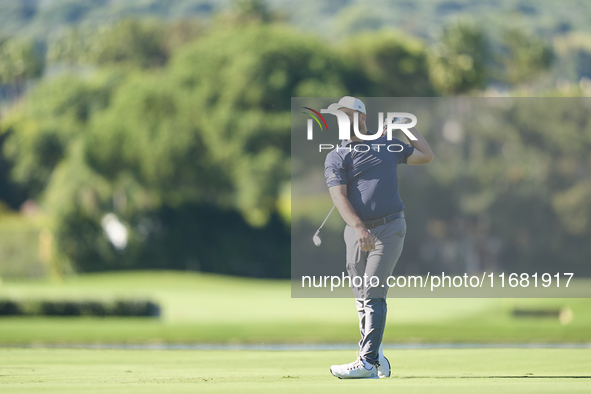 Jon Rahm of Spain plays his second shot on the 14th hole on the third day of the Estrella Damm N.A. Andalucia Masters 2024 at Real Club de G...