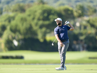 Jon Rahm of Spain plays his second shot on the 14th hole on the third day of the Estrella Damm N.A. Andalucia Masters 2024 at Real Club de G...